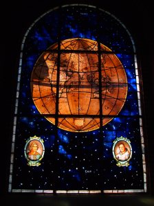A stain-glass window/relief in the Chilean Naval Museum...where Copernicus sees eye-to-eye with Neil Armstrong